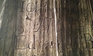 Wood walls from an old jail cell. Even their boredom graffiti was elegant back in the day.