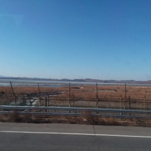 Holy Shit... our first glimpse of NK across the river, taken from the tour bus.