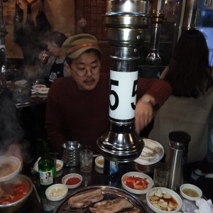 Our awesome host for the evening "T", getting our Korean BBQ ready