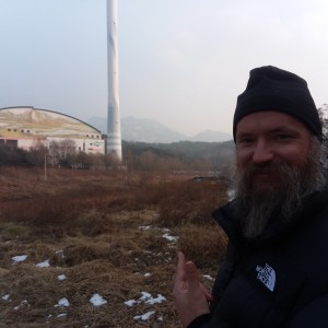Snowy mountains, but hard to see from the pollution/smog from China.